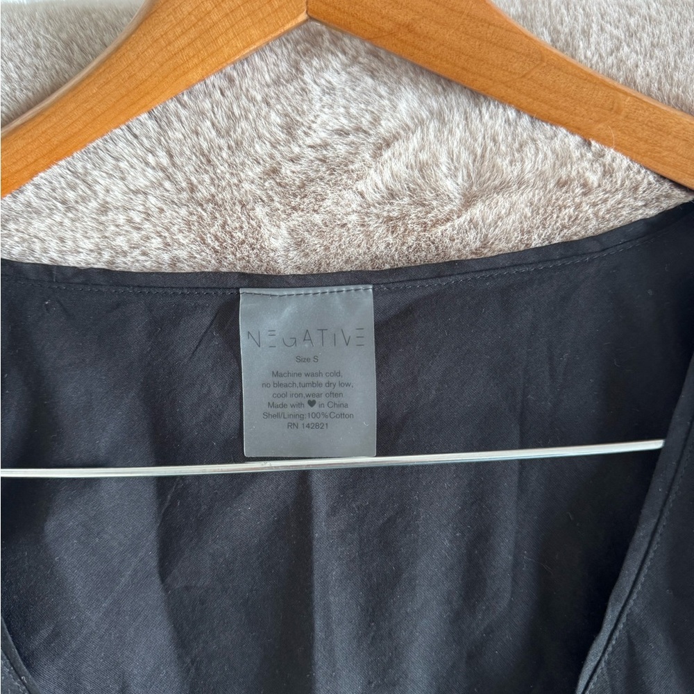 Negative Button Sleeveless Top - Picture 3 of 5